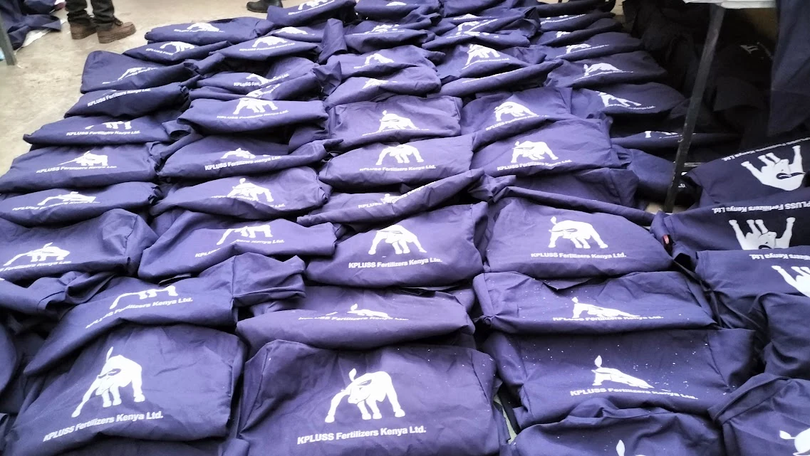 Bulk branded corporate T-shirts arranged after production